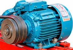 Close-up of a motor and pulley on a Seth Tufail toka machine