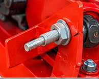 Close-up of the toka machine tension bolt