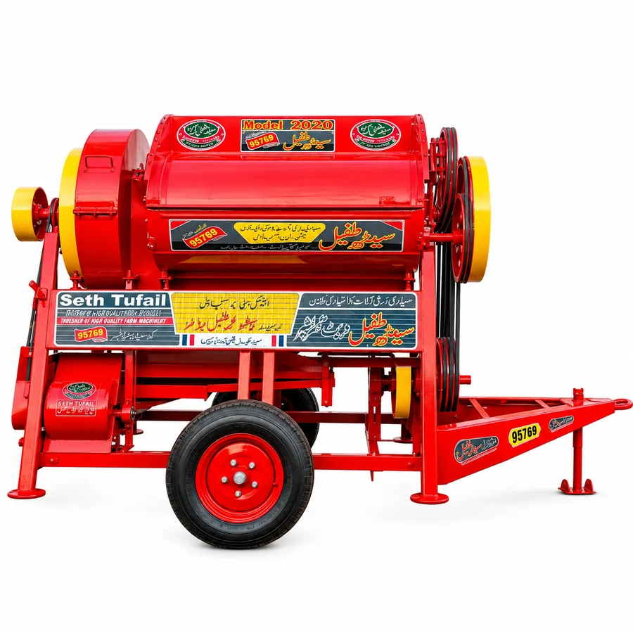 Seth Tufail wheat thresher with feed hopper, pulleys and transport wheels